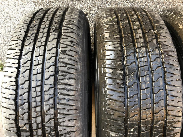 275/65/18 ALL SEASONS GOODYEAR SET OF 2 $250.00 TAG#1969 (NPLN502159JT1) MIDLAND ONT. in Tires & Rims in Ontario