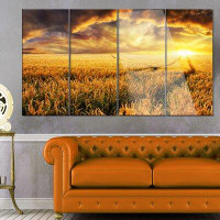 Made in Canada - Design Art 'Amazing Sunset Over Yellow Field' 4 Piece Photographic Print on Metal Set