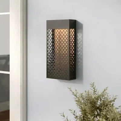 This LED Outdoor Flush Mount brings warm light and geometric elegance to modern entryways. When illu...