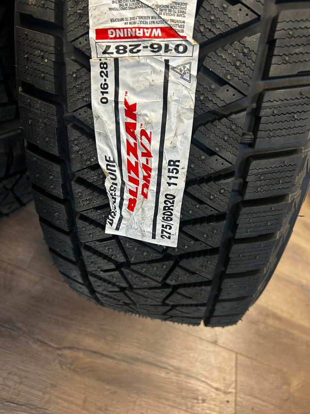 R211-20 GMC rims and Bridgestone Blizzak DM-V2 Winter tires in Tires & Rims in Edmonton Area