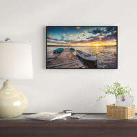 East Urban Home 'Boats and Jetty Under Dramatic Sky' Photographic Print on Wrapped Canvas