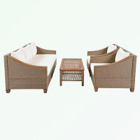 Red Barrel Studio 4-Piece Rattan Outdoor Conversation Sofa Set with Coffee Table and Cushions
