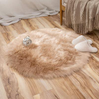 Mercer41 Round Lianet Solid Color Machine Woven Faux Sheepskin Area Rug in Beige