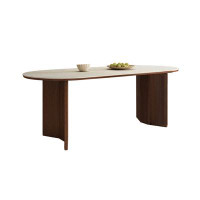 Orren Ellis Oval solid wood dining table.