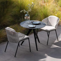 Corrigan Studio Villa garden terrace patio dining table set