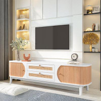 Bay Isle Home™ Anusri 66.93" W Rattan Storage Credenza, TV Stand with Curved Sliding Doors and Two Drawers
