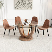 Mercer41 A modern minimalist circular tempered glass dining table