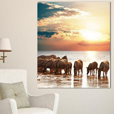 Design Art 'Herd of Zebras in Clear Lake' Photographic Print on Wrapped Canvas in Arts & Collectibles