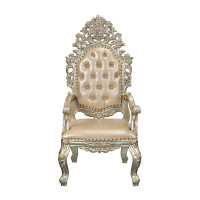 Andrew Home Studio Tufted Arm Chair in Antique Gold