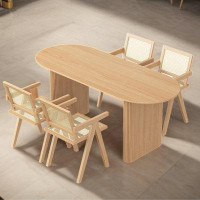 Corrigan Studio Oval solid wood dining table and chairs
