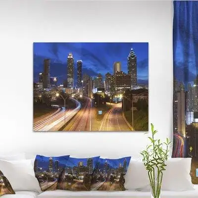 This product was proudly made in Canada. This Cityscape 'Atlanta Skyline Twilight Blue Hour' Photogr...