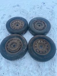 235/70R16 Set of 4 rims and tires that  came off from a 2008 Ford Escape.