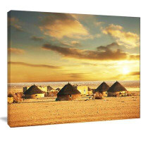 Made in Canada - East Urban Home 'Beautiful African Village Huts' Framed Photographic Print on Wrapped Canvas