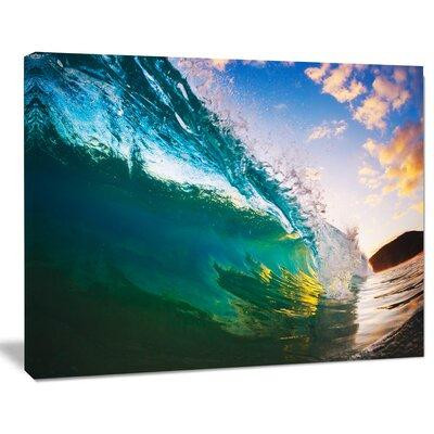 Design Art Ocean Wave at Sunset Photographic Print on Wrapped Canvas in Arts & Collectibles