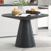 Latitude Run® Stylish Round Dining Table, Minimalist Elegance For Your Living Room Or Dining Area