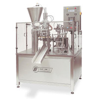 Filler Packaging machine with rotary platform, pouch dispenser and ejector, room for two fill sealing and cooling bars.