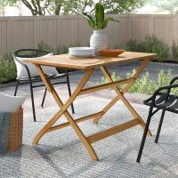 Gracie Oaks Amaure Folding Wooden Dining Table