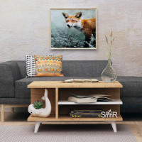 East Urban Home Newt 4 Legs Coffee Table with Storage