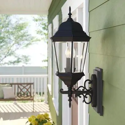 This 3-light outdoor wall lantern brightens up your entryway or garage and helps set the tone for yo...
