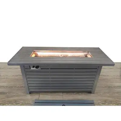 This outdoor fire pit table creates a cozy focal point in any backyard or patio space. It’s a rectan...