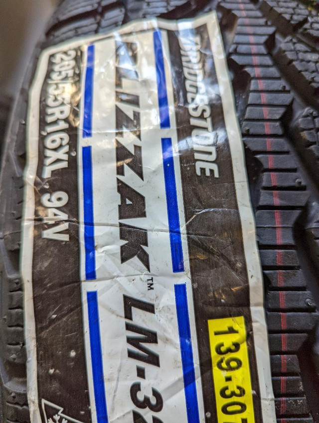 BRAND NEW WITH LABELS ULTRA HIGH PERFORMANCE  BRIDGESTONE   205 / 55 / 16  WINTER  TIRE     SET OF     FOUR. in Tires & Rims in Ontario