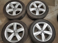 Used 215 55 17 Bridgestone All season tires on OEM VW Passat 5x112 wheels in very good condition