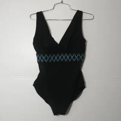 Used - Like New Approx. $165CAD New A high-quality one-piece swimsuit, great for any water sport act...