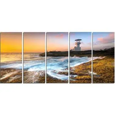 Made in Canada - Design Art 'Lighthouse on Beautiful Seashore' Photographic Print Multi-Piece Image on Canvas