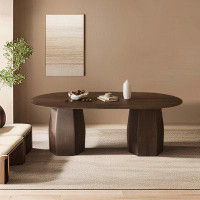 Latitude Run® Minimalist solid wood dining table Modern creative oval dining table.