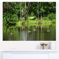 Made in Canada - Design Art 'Bushes and Trees in River Bank' Photographic Print Multi-Piece Image on Wrapped Canvas