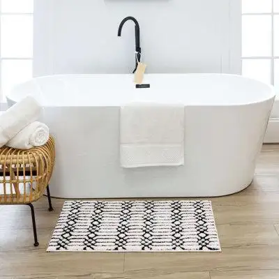 Refresh the bath spaces around your home with this essential bath collection featuring a geometric-i...