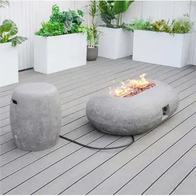 Create a warm and inviting atmosphere with our Concrete Outdoor Fire Pit Table. Crafted with high-qu...