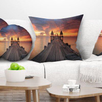 Made in Canada - East Urban Home Pier Seascape Glowing Sky and Long Wooden Bridge Pillow
