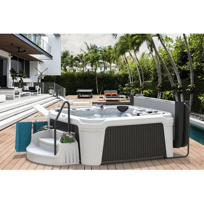 AquaRest Spas, powered by Jacuzzi® pumps DayDream Ensemble 7-Person 35-Jet Hot Tub with Spa Accessories, powered By Jacu in Hot Tubs & Pools