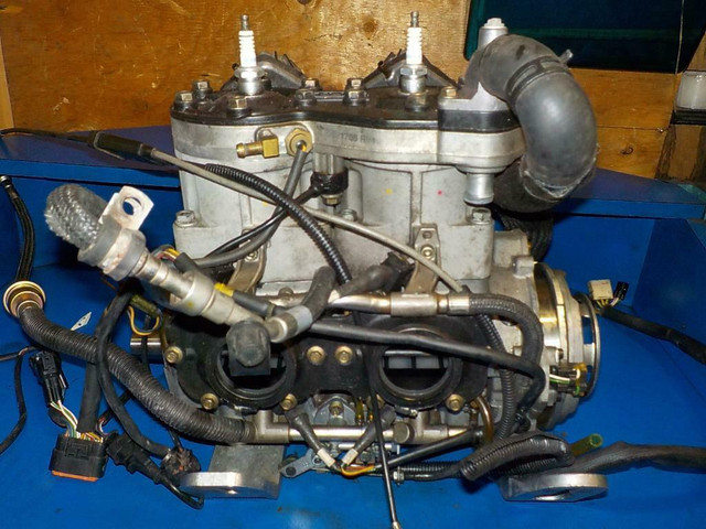 SNOWMOBILE ENGINES AT KK MOTORS PRINCE GEORGE UPDATED WEEKLY USED/ REBUILT EXCHANGE ENGINES ALL MODELS AND MAKES in Snowmobiles Parts, Trailers & Accessories in British Columbia - Image 2