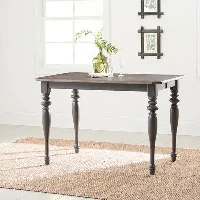 Gather around the Ocean Isle gathering table. Crafted of rubberwood solids with pine veneers this pi...