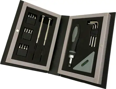 BOOK SHAPED TOOL KIT INCLUDES MINI SCREWDRIVER, TWELVE DRILL BITS, HEX KEYS, AND A BUILT-IN LEVEL! T...