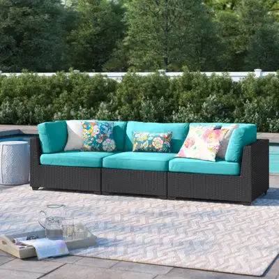 Turn your backyard into an outdoor oasis with this plush low-profile sofa. It features seating for u...