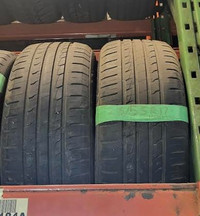 USED PAIR OR ALL SEASON IRONMAN 215/55R17 75% TREAD WITH INSTALL.
