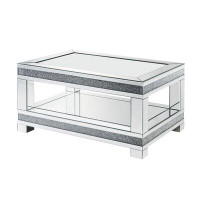Everly Quinn Noyack 4 Legs Coffee Table with Storage
