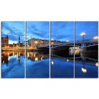 Made in Canada - Design Art 'Illuminated Blue Stockholm' 4 Piece Wall Art on Wrapped Canvas Set