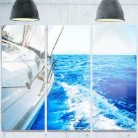 Made in Canada - Design Art 'White Sailing Yacht in Blue Sea' 3 Piece Photographic Print on Metal Set