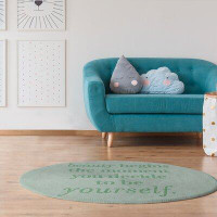 East Urban Home Handwritten True Beauty Quote Poly Chenille Rug