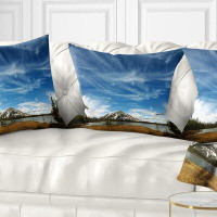 Made in Canada - East Urban Home Seashore Mountain and Lake Under Sky Pillow