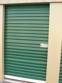 NEW IN STOCK! Brand new white 5 x 7 roll up door great for shed or garage!