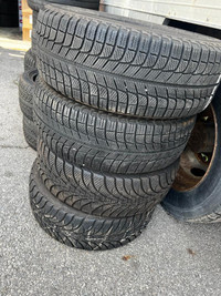FOUR USED 205 / 55 R16 MICHELIN/GOODYEAR TIRES !!