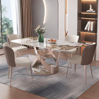 Everly Quinn Italian-style minimalist rectangular modern rock plate dining table+4 dining chair combinations.