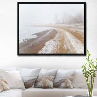 East Urban Home 'Sandy Beach in the Winter Fog' Framed Photograph on Canvas