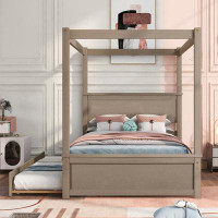 Red Barrel Studio Wood Canopy Bed with Trundle Bed