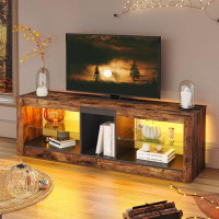 Latitude Run® Roika LED TV Stand for 60 inch TV,  Modern Gaming TV Cabinet with Glass Shelves and Power Outlet